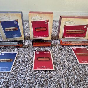 2004 Hallmark Keepsake Ornaments of the iconic Lionel Hiawatha model train.